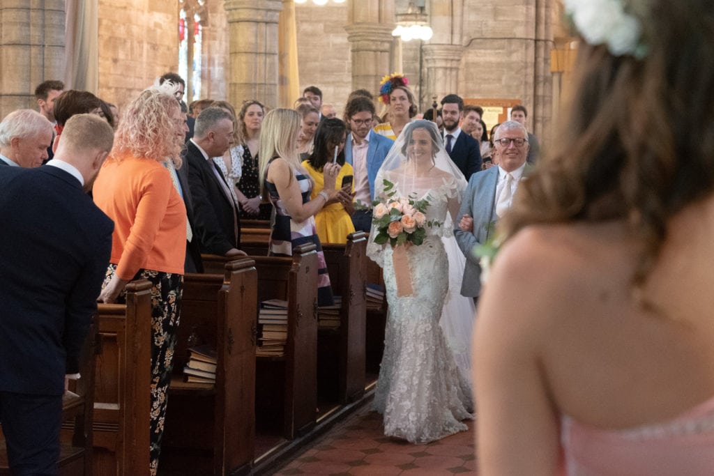 Bride & father of the bride walking down the aisle