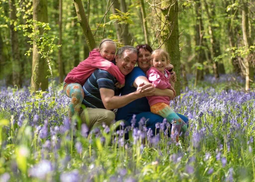 Family portrait in the bluebells