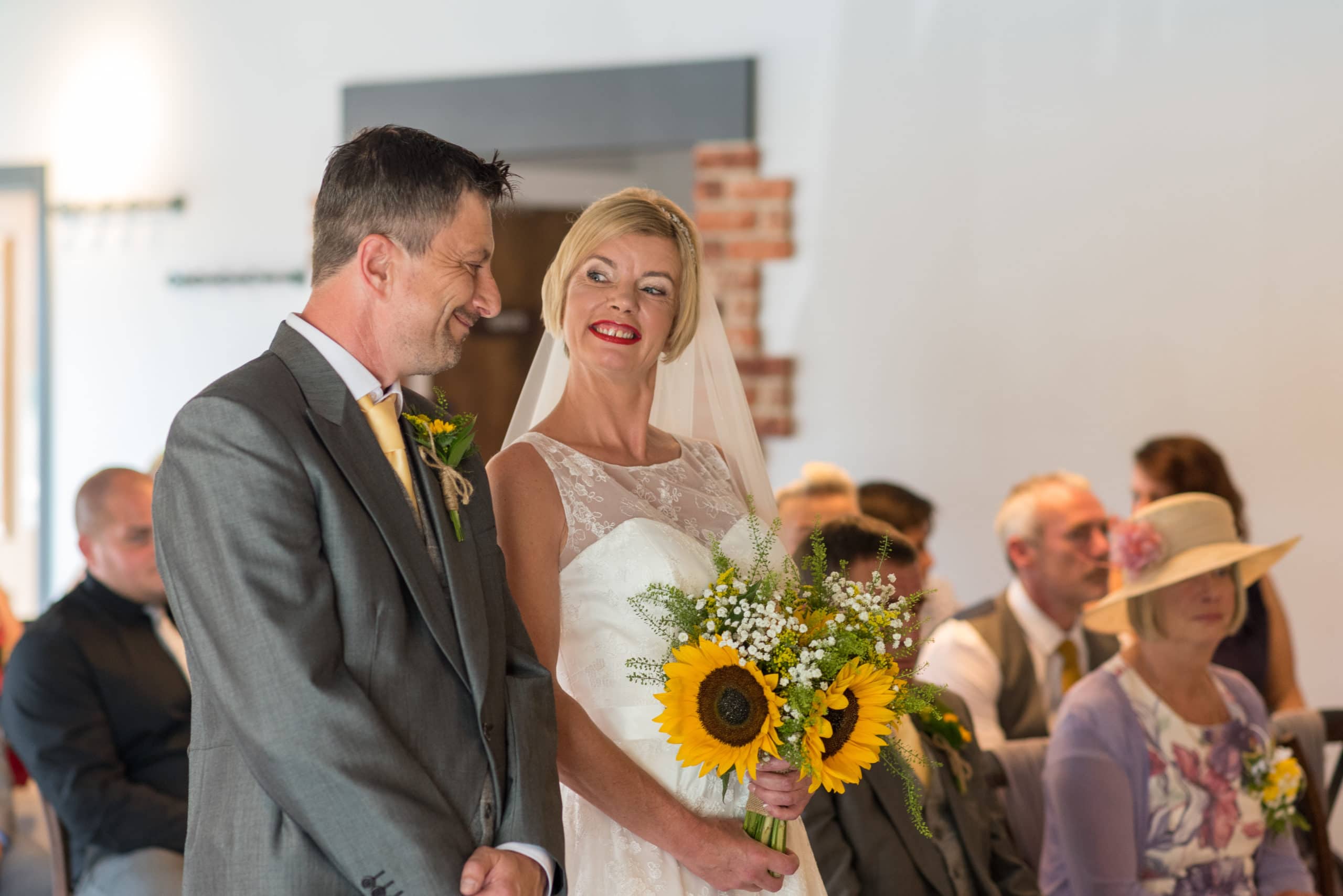 Couple enjoying their wedding with sunflower