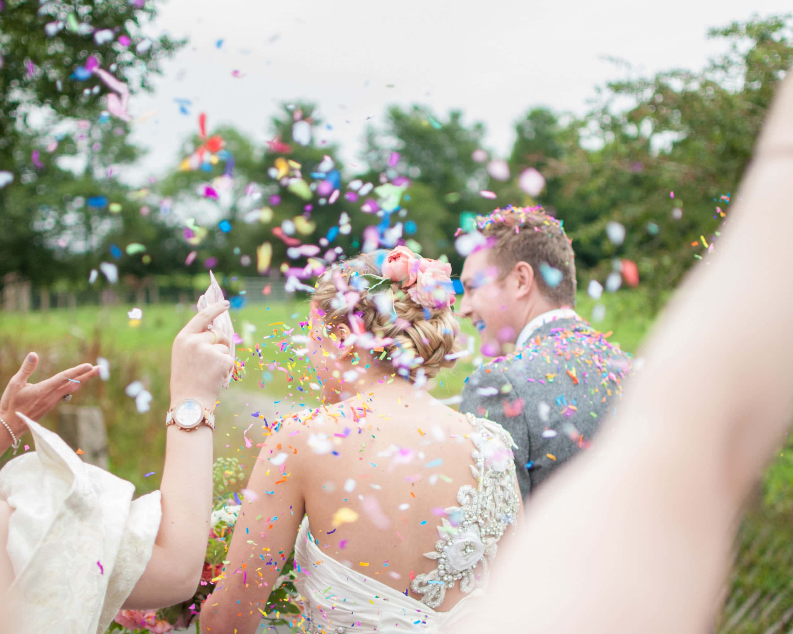 The colour of confetti thrown at a bride and groom.