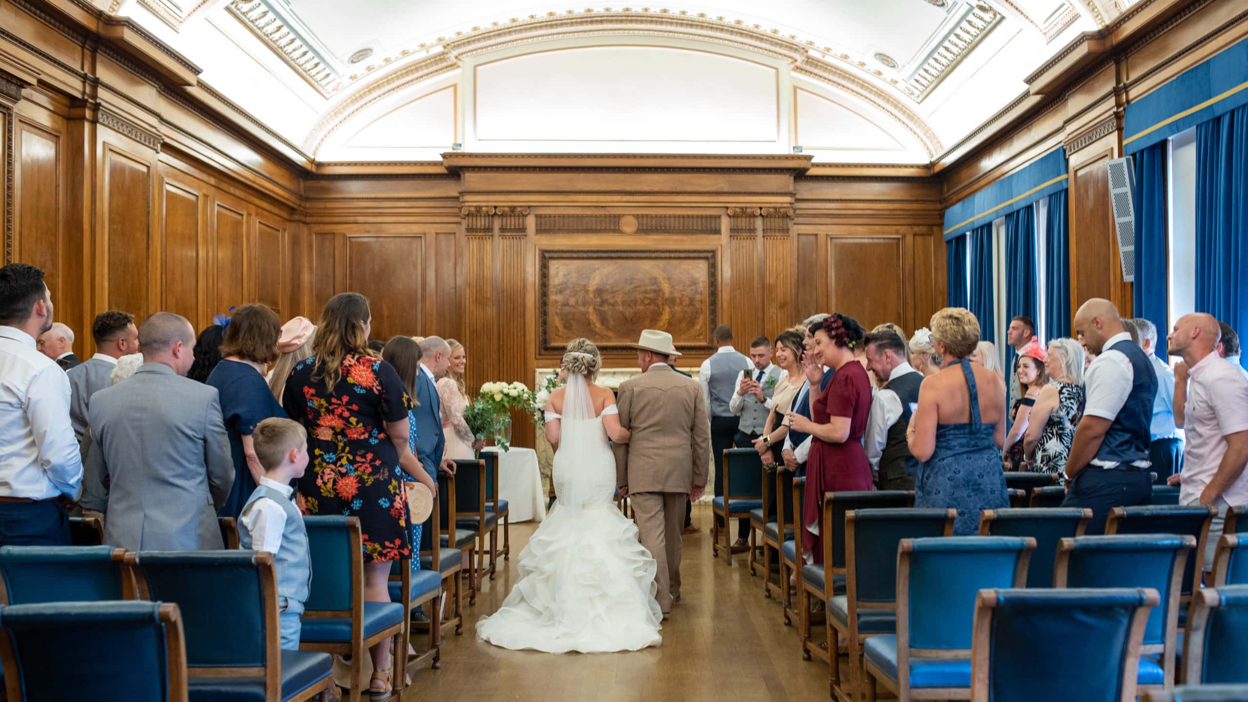 The bride walking down the aisle