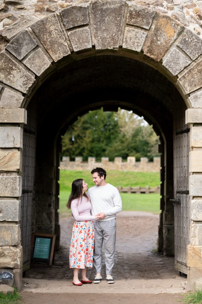 Engagement shoot under an arch