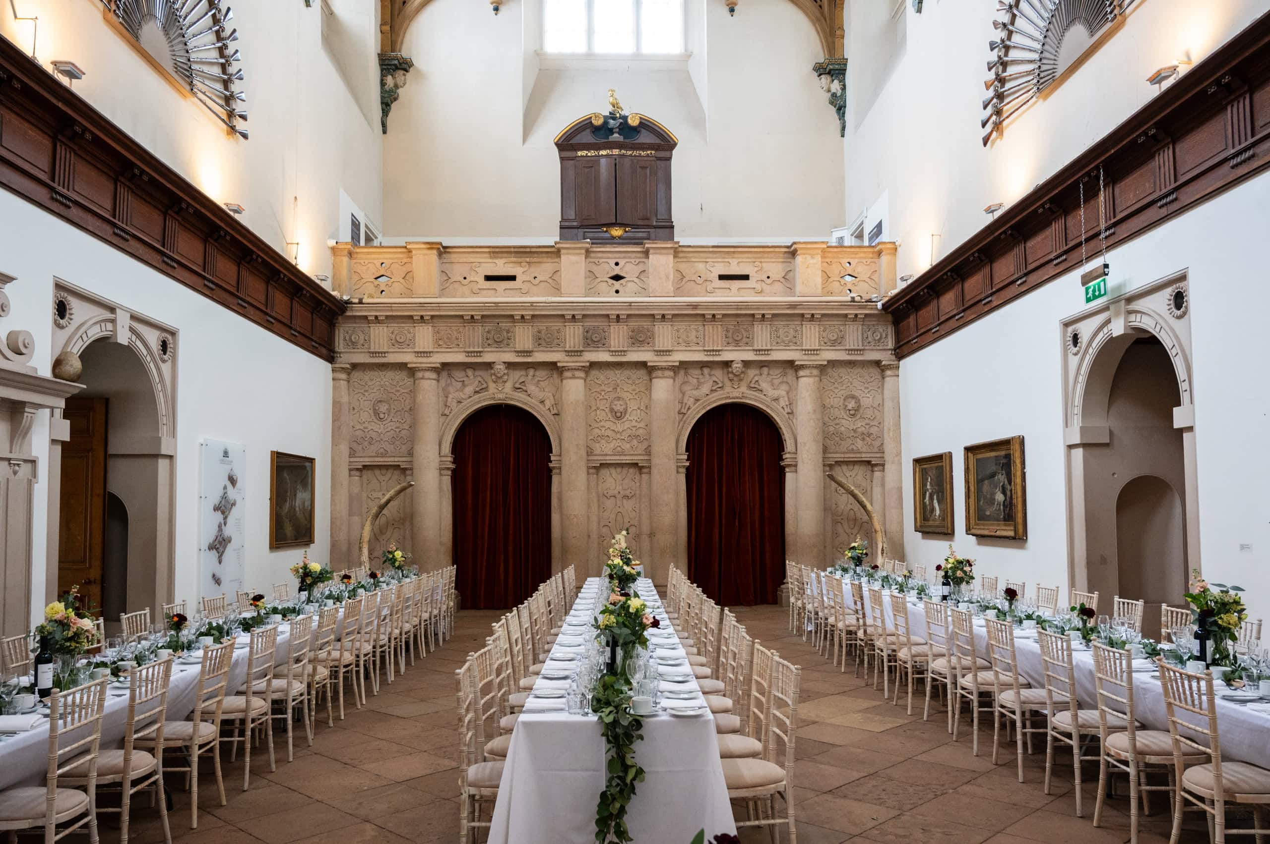 Tables set for the wedding breakfast in the Great Hall at Wollaton Hall