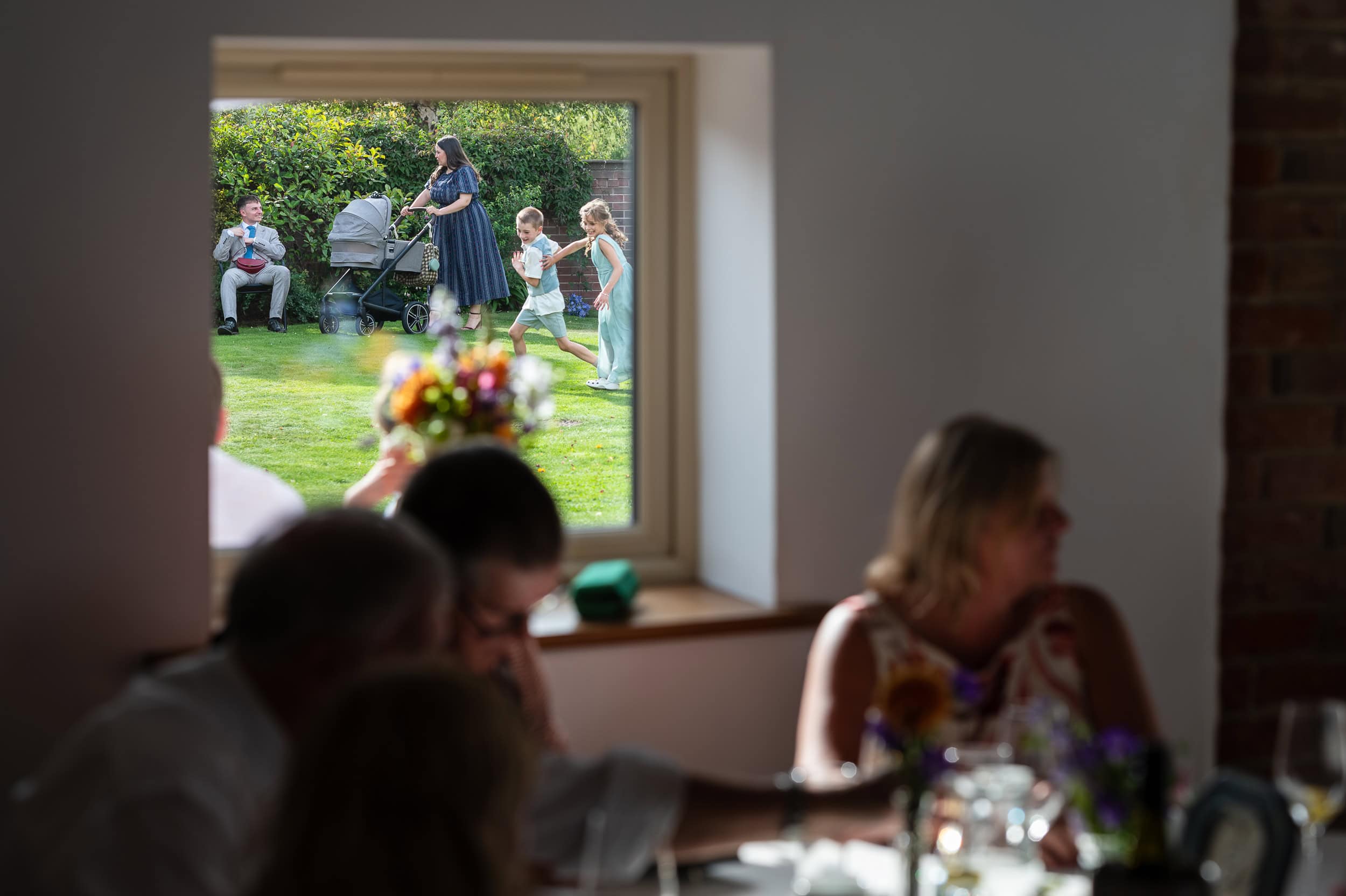 Kids playing on the lawn at Dunstall Barn