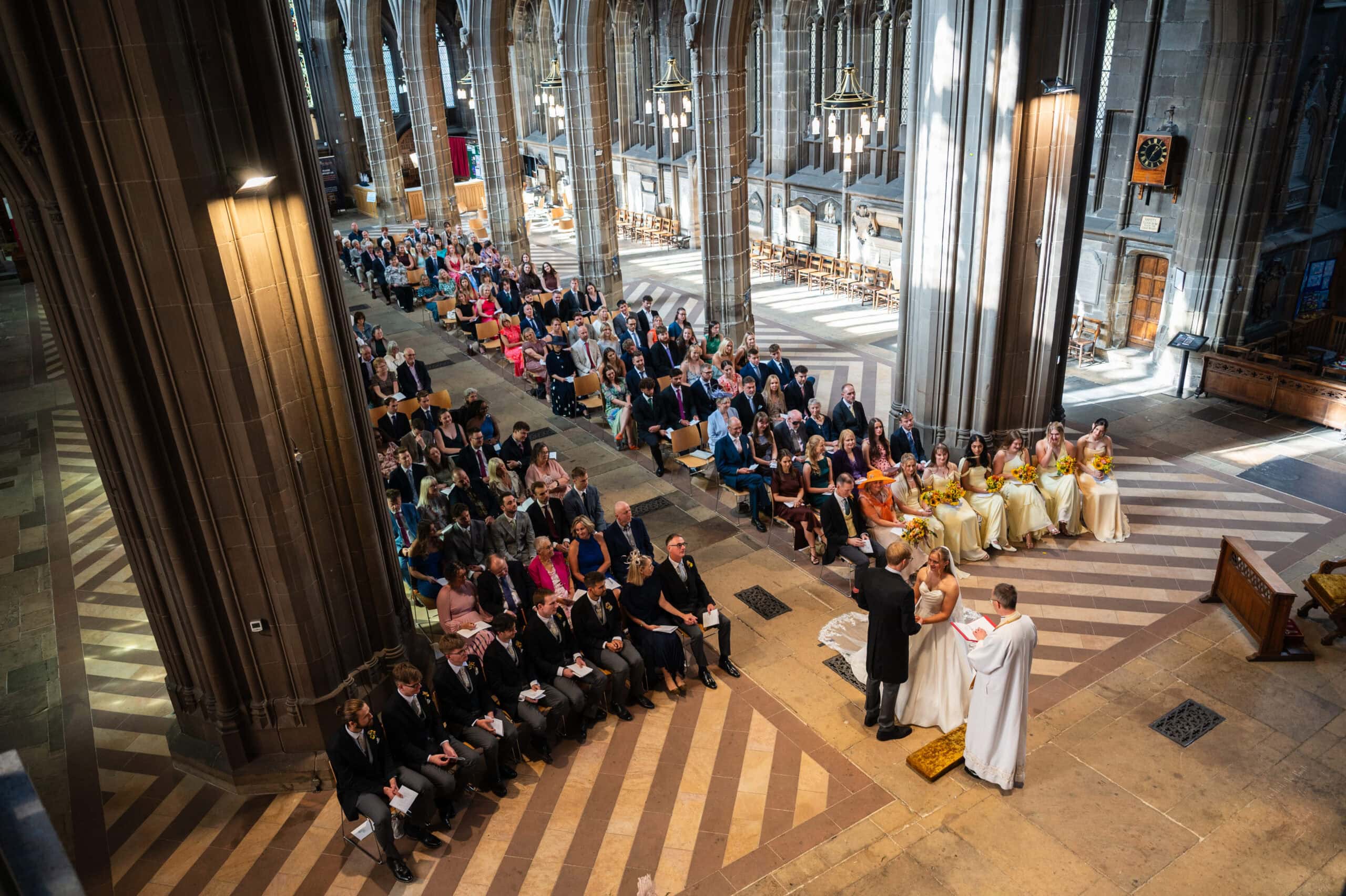 Looking down from the organ balcony on a wedding ceremony at St Mary's in the Lace Market, Nottingham.