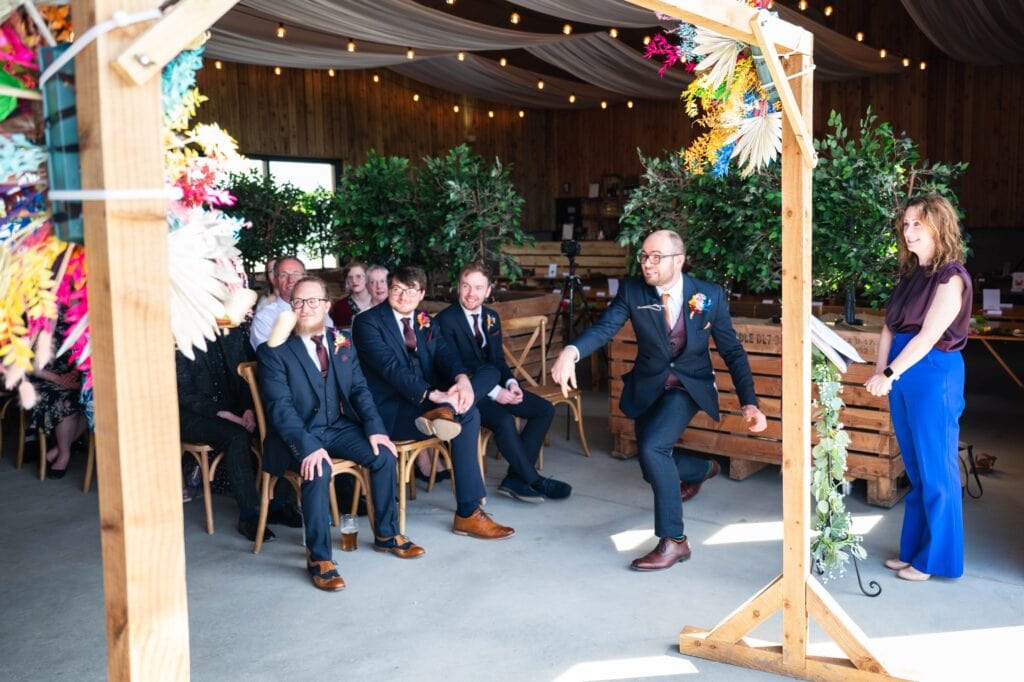 Paul throwing in a game of Throw Throw Burrito to decide who says their vows first at Sedgewell Barn