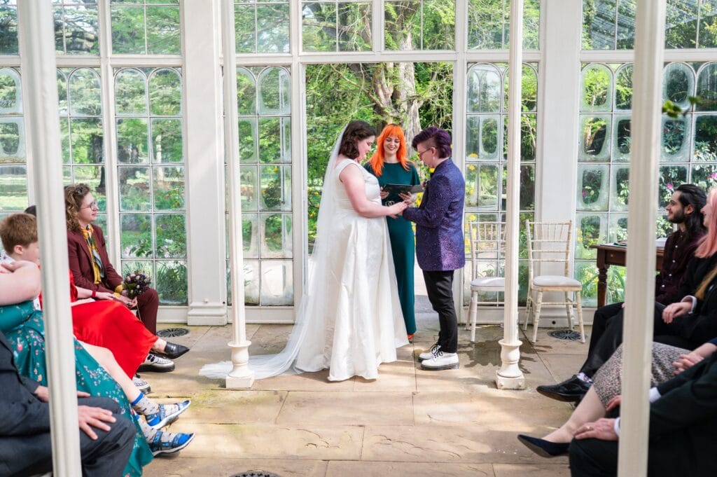 Celebrant wedding ceremony in the glasshouse Camellia House at Wollaton Hall, Nottingham